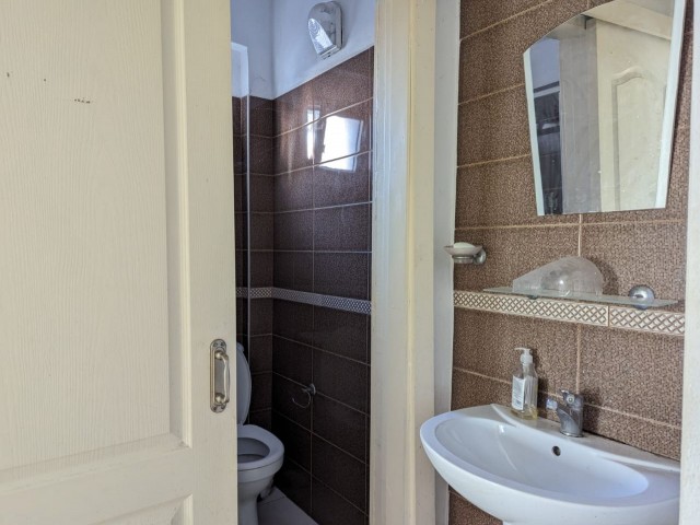 IN GIRNE TURK DISTRICT, SUITABLE FOR BOTH INVESTMENT AND USE, TURKISH KOÇANLI, 2+1, 70 SQUARE METER SIZE, GROUND FLOOR FLAT