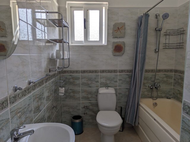 IN GIRNE BEYLERBEYİ (BELLAPAİS), IN A GREAT LOCATION WITH A VERY HIGH PREFERENCE RATE, BUILT ON A LARGE PLOT OF 1445 SQUARE METERS WITH EQUIVALENT KOÇANLI, WITH 5X10 SWIMMING POOL, CENTRAL HEATING SYSTEM INCLUDING HOBBERS FINISHED, AIR CONDITIONED, FULLY NEWLY FURNISHED, WITH AN ACTIVE WATER WELL IN