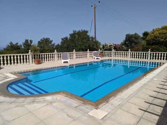 IN GIRNE BEYLERBEYİ (BELLAPAİS), IN A GREAT LOCATION WITH A VERY HIGH PREFERENCE RATE, BUILT ON A LARGE PLOT OF 1445 SQUARE METERS WITH EQUIVALENT KOÇANLI, WITH 5X10 SWIMMING POOL, CENTRAL HEATING SYSTEM INCLUDING HOBBERS FINISHED, AIR CONDITIONED, FULLY NEWLY FURNISHED, WITH AN ACTIVE WATER WELL IN