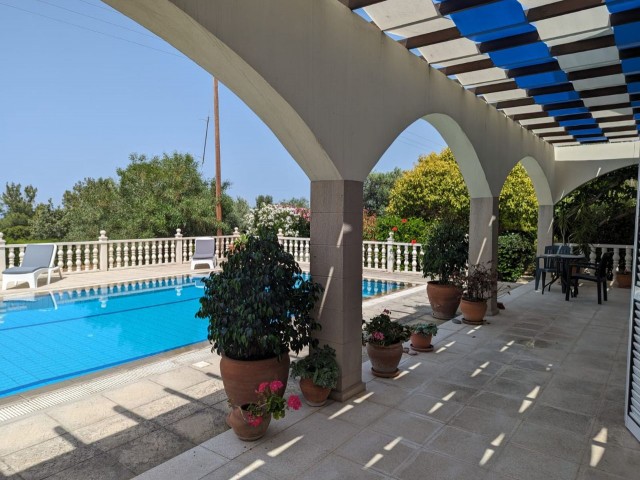 IN GIRNE BEYLERBEYİ (BELLAPAİS), IN A GREAT LOCATION WITH A VERY HIGH PREFERENCE RATE, BUILT ON A LARGE PLOT OF 1445 SQUARE METERS WITH EQUIVALENT KOÇANLI, WITH 5X10 SWIMMING POOL, CENTRAL HEATING SYSTEM INCLUDING HOBBERS FINISHED, AIR CONDITIONED, FULLY NEWLY FURNISHED, WITH AN ACTIVE WATER WELL IN