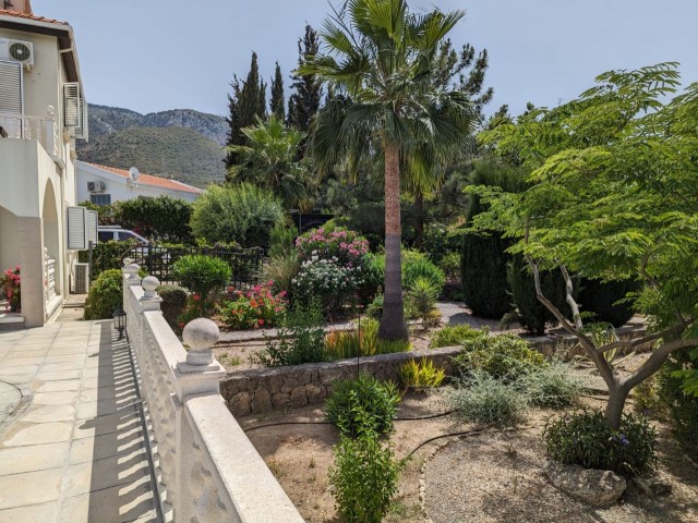 IN GIRNE BEYLERBEYİ (BELLAPAİS), IN A GREAT LOCATION WITH A VERY HIGH PREFERENCE RATE, BUILT ON A LARGE PLOT OF 1445 SQUARE METERS WITH EQUIVALENT KOÇANLI, WITH 5X10 SWIMMING POOL, CENTRAL HEATING SYSTEM INCLUDING HOBBERS FINISHED, AIR CONDITIONED, FULLY NEWLY FURNISHED, WITH AN ACTIVE WATER WELL IN