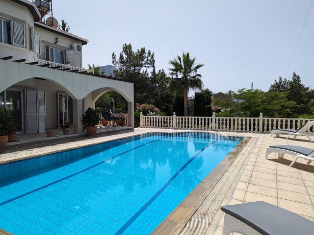 IN GIRNE BEYLERBEYİ (BELLAPAİS), IN A GREAT LOCATION WITH A VERY HIGH PREFERENCE RATE, BUILT ON A LARGE PLOT OF 1445 SQUARE METERS WITH EQUIVALENT KOÇANLI, WITH 5X10 SWIMMING POOL, CENTRAL HEATING SYSTEM INCLUDING HOBBERS FINISHED, AIR CONDITIONED, FULLY NEWLY FURNISHED, WITH AN ACTIVE WATER WELL IN