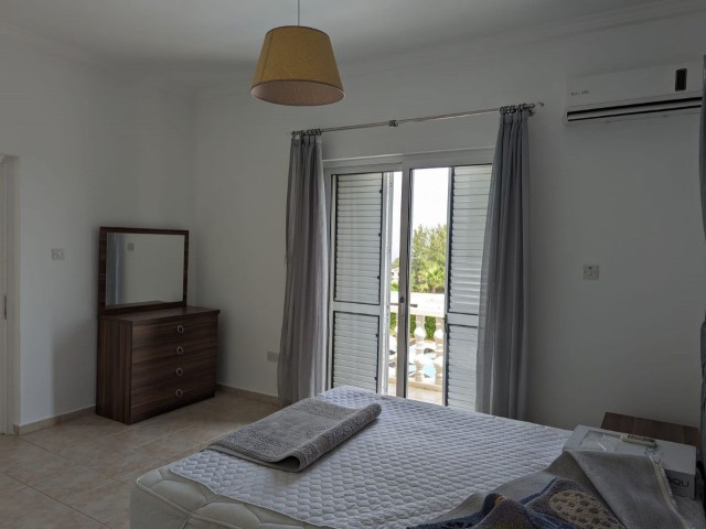 IN GIRNE BEYLERBEYİ (BELLAPAİS), IN A GREAT LOCATION WITH A VERY HIGH PREFERENCE RATE, BUILT ON A LARGE PLOT OF 1445 SQUARE METERS WITH EQUIVALENT KOÇANLI, WITH 5X10 SWIMMING POOL, CENTRAL HEATING SYSTEM INCLUDING HOBBERS FINISHED, AIR CONDITIONED, FULLY NEWLY FURNISHED, WITH AN ACTIVE WATER WELL IN