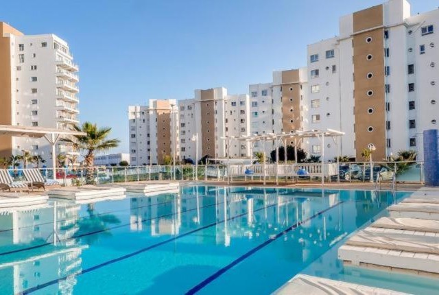 Iskele-long beach bolgesinin en guzel yazlik sitelerinde ceasar resort'da2+1 satilik daire