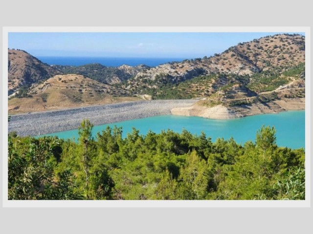 Проект века в Гечиткёй, Кирения, в 1 км от плотины Гечиткёй и всего в 5 минутах от моря, 4 декара земли на продажу