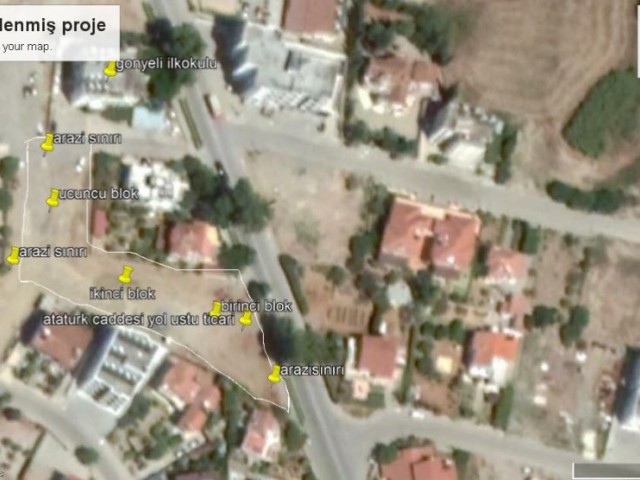 3 acres Türkish title land. Building permissions ready. 44 apartment and 500 square meter shop. On the main road.