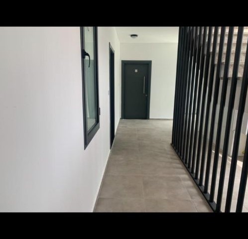 1+1 FLAT IN ALSANCAK WITHIN QUALIFIED SITE AND WALKING DISTANCE TO THE SEA ** 