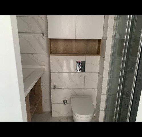 1+1 FLAT IN ALSANCAK WITHIN QUALIFIED SITE AND WALKING DISTANCE TO THE SEA ** 