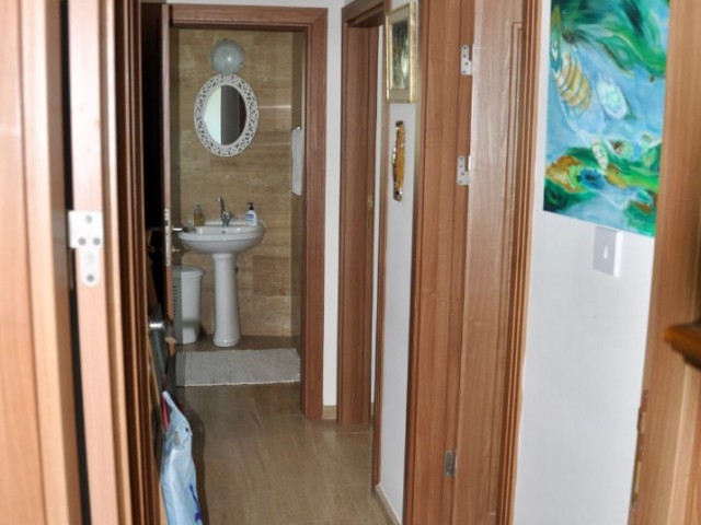 2+1 Flat for Sale in Kyrenia City Center with Sea View, All Taxes Paid