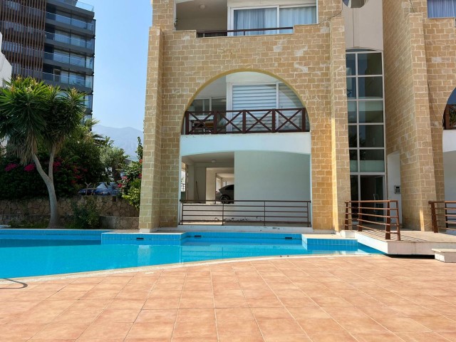 Rental flat in the center of Kyrenia in a decent clean patalena site surrounded by pools on all four sides with 24-hour private security, earthquake-tested, 600 pounds sterling fee