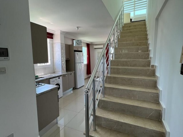 Unique duplex penthouse apartment on the 9th and 10th floors of a 10-storey building in the center of Kyrenia, offering a peaceful life with a panoramic view to the entire Kyrenia and safe and secure neighbors with elevators. 05338445618