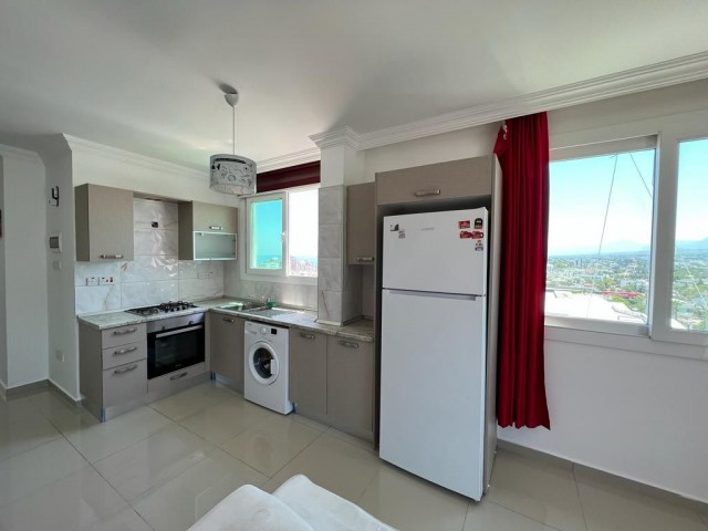 Unique duplex penthouse apartment on the 9th and 10th floors of a 10-storey building in the center of Kyrenia, offering a peaceful life with a panoramic view to the entire Kyrenia and safe and secure neighbors with elevators. 05338445618