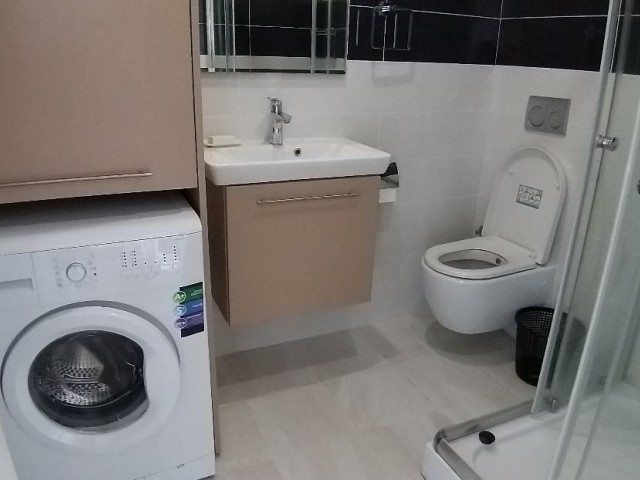 In the center of Kyrenia, 50m away from the bus stops, in a complex with 24-hour security, an earthquake-tested, luxuriously furnished ground floor flat for rent. A monthly down payment of £600 is included in the annual down payment of £550. 05338445618