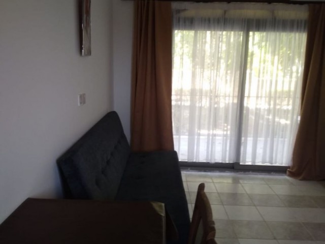 GİRNE ALSANCAK'DA  TATİL KÖYÜ İÇERİSİNDE KİRALIK 1+1 DAİRE REF1048