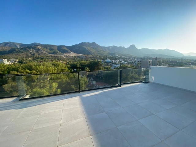 Duplex 2 +1 135m2 +100m2 Terrace with Sea and Mountain Views in the Center of Kyrenia is not closed Penthouse for Sale 135,000stg ** 