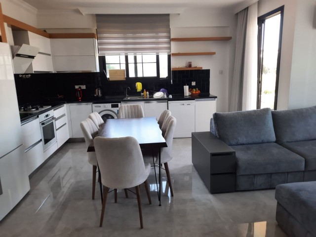 Zeytinlikte 3+1 135m2  Ful Eşyalı Zeminkat Bahçeli Satılık Daire 159.900stg