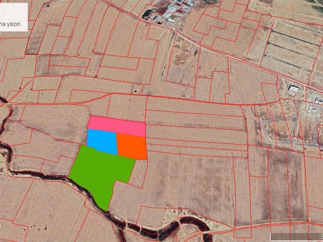 GROSSE INVESTITIONSMÖGLICHKEIT !!!  In Nicosia Batıkent Region, 30 Hektar Land zu verkaufen gegenüber Yenikent 1. 350. 000Stg.    