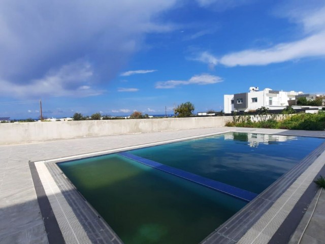 Triplex Villa for Sale in Kyrenia Zeytinlik 135m2 4+1 Site with Shared Pool