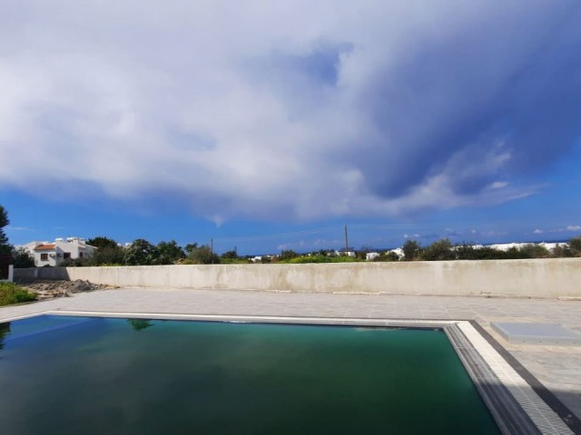 Triplex Villa for Sale in Kyrenia Zeytinlik 135m2 4+1 Site with Shared Pool