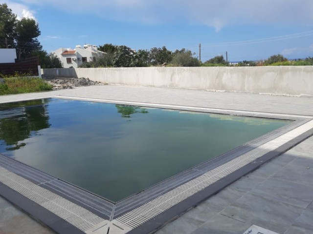 Triplex Villa for Sale in Kyrenia Zeytinlik 135m2 4+1 Site with Shared Pool