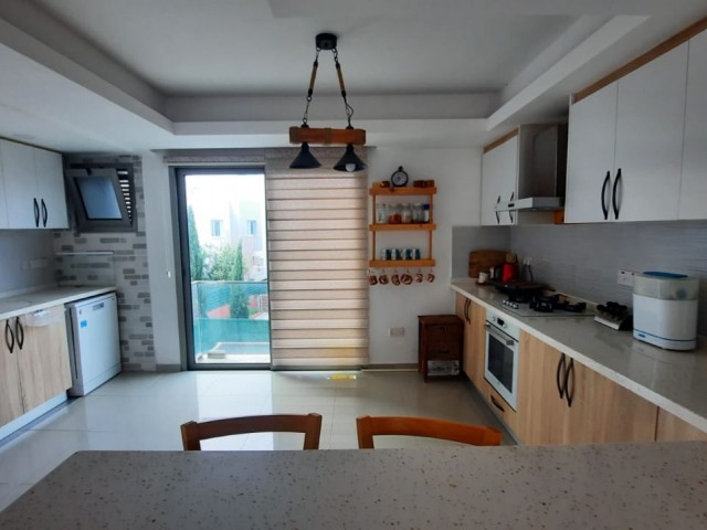 Triplex Villa for Sale in Kyrenia Zeytinlik 135m2 4+1 Site with Shared Pool