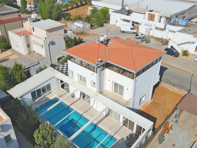 A Perfect Villa Offering Luxury and Comfort With an Outdoor-Indoor Pool in the Most Valuable Location of Güzelyurt Merkezi! ** 