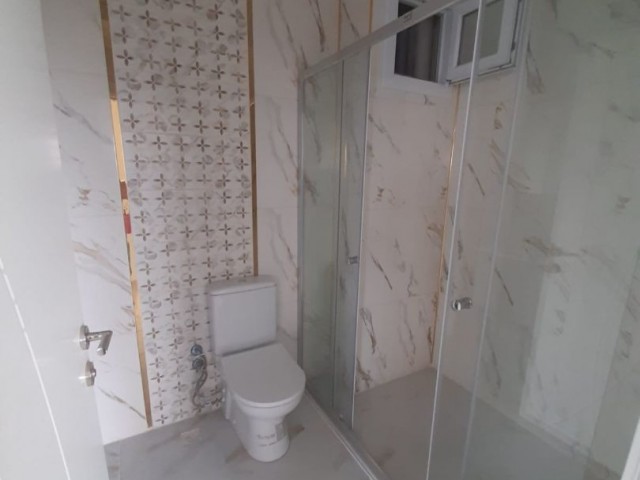 2+1 flats for sale in iskele long beach unfurnished flats 85 square meters 130.000 STG WALKING DISTANCE TO THE SEA QUALITY WORKMANSHIP 3rd floor flat is at the back.