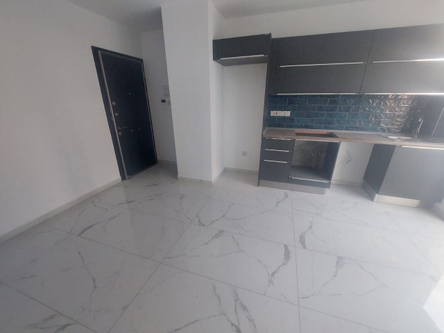 İskelede satılık 2+1 apartman dairesı 4.katta son 1 adet full eşyalı 115,000£ 75 metre kare 