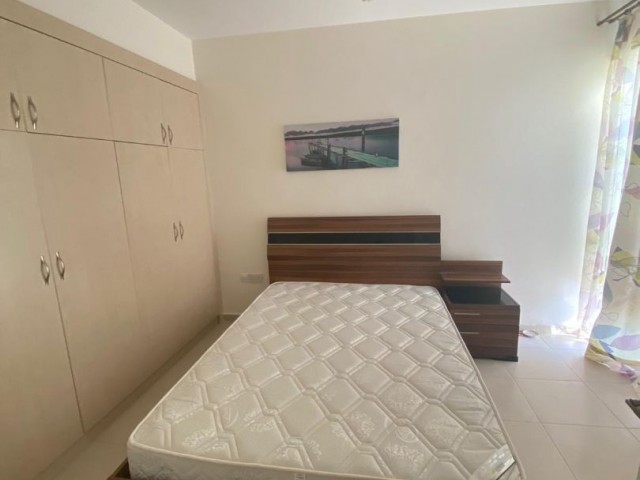 2+1 apartment with a fully furnished large garden on the Caesar Beach of Iskele-Bosphorus from Ozkaraman (all taxes have been paid) ** 