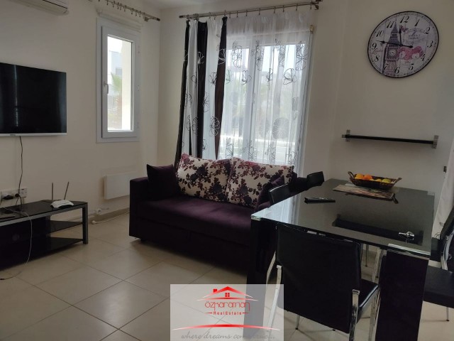 ÖZKARAMAN'dan  İskele-Boğaz Caesar Beach de kiralık 2+1 Daire