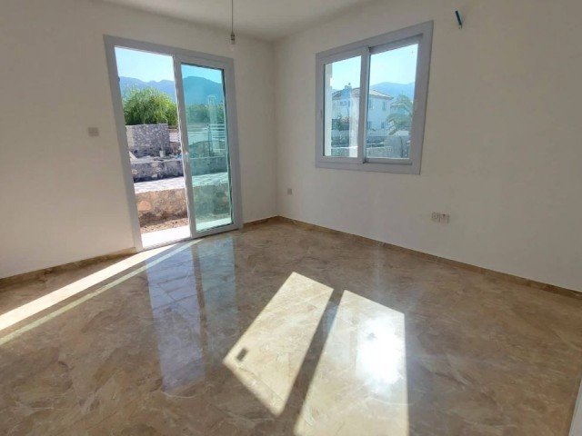 2 bedroom garden floor apartment for sale in Alsancak