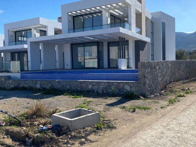 3+1 VILLA IN CATALKOY, 50 METERS FROM THE SEA!