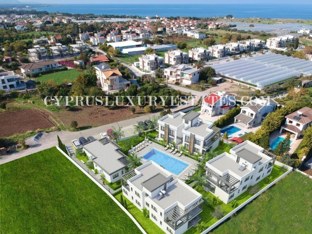 LUXURY 2+1 DAİRELER GiRNE ALSANCAK BÖLGESİNDE ŞOKMAR ALTINDA DENİZE 10 DK MESAFEDE !