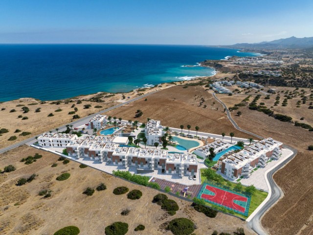 Kuzey Kıbrıs Esentepe'de plaja yürüme mesafesinde 1  yatak odalı denize sıfır penthouse daireler