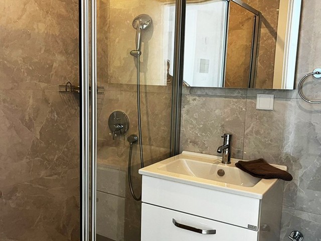 PENTHOUSE-WOHNUNG MIT 2 SCHLAFZIMMERN ZUM VERKAUF MIT MEERBLICK IN KYRENIA BAHCELI