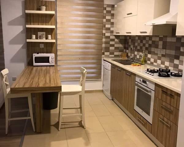 Girne Merkezde Her yere yakın güvenlik - asansör -bariyerli otopark -jeneratör hizmeti bulunan residence binada kiralık 2+1 FULL eşyalı daire