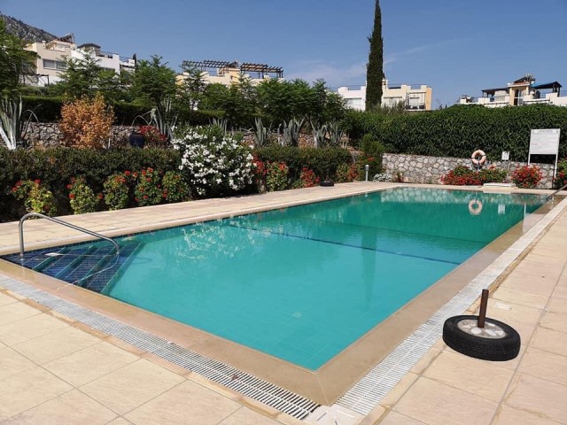 OPPORTUNITY...2+1 FULLY FURNISHED GROUND FLOOR APARTMENT IN EDREMIT, THE PEARL OF KYRENIA, OFFERING 2 SWIMMING POOLS AND A PRIVATE LARGE GARDEN-BARBECUE FOR YOUR HOME ** 