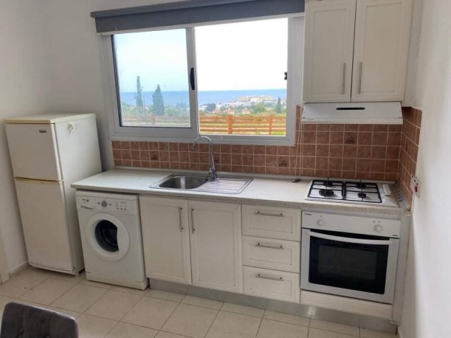 OPPORTUNITY...2+1 FULLY FURNISHED GROUND FLOOR APARTMENT IN EDREMIT, THE PEARL OF KYRENIA, OFFERING 2 SWIMMING POOLS AND A PRIVATE LARGE GARDEN-BARBECUE FOR YOUR HOME ** 