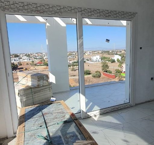 A PENTHOUSE FOR 78,000 POUNDS AT AN UNMISSABLE PRICE IN YENIBOGAZ. IT IS BUILT WITH 1ST CLASS MATERIALS 600 METERS FROM THE SEA. DELIVERY DATE October 2022 ** 