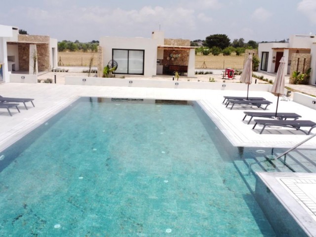 2+1 furnished villa for sale in a perfect site where green and blue meet in Dipkarpaz