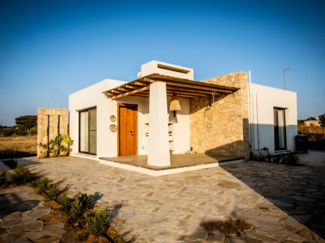 2+1 furnished villa for sale in a perfect site where green and blue meet in Dipkarpaz