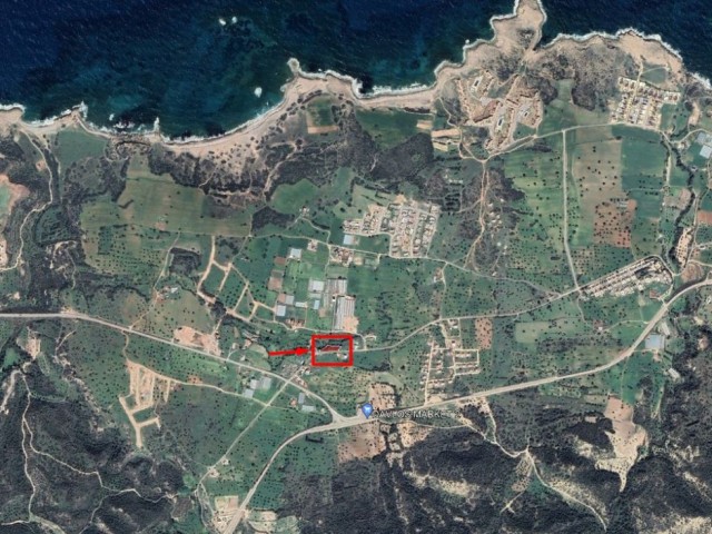 1400 m2 Grundstück zum Verkauf in Tatlısu, neben der Straße mit 35 % Zoneneinteilung
