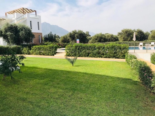 FULLY FURNISHED 2+1 APARTMENT FOR RENT WITH ITS OWN PRIVATE GARDEN IN A COMPLEX WITH POOL IN OLIVE GİRNE