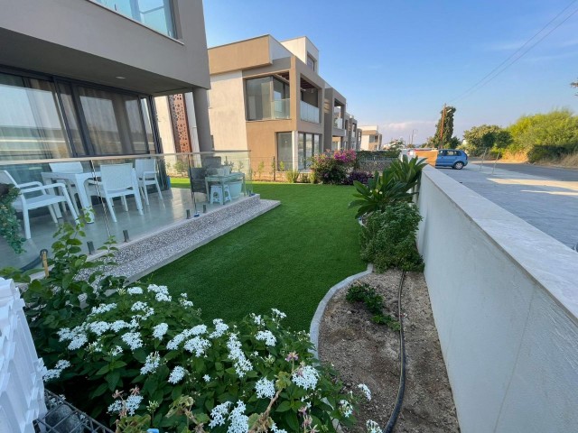 2+1 APARTMENT FOR SALE IN CYPRUS GİRNE ALSANCAK WITH ITS OWN PRIVATE GARDEN 100 METERS FROM THE SEA WITH MOUNTAIN AND SEA VIEWS