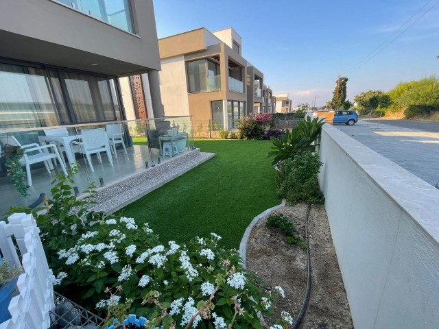2+1 APARTMENT FOR SALE IN CYPRUS GİRNE ALSANCAK WITH ITS OWN PRIVATE GARDEN 100 METERS FROM THE SEA WITH MOUNTAIN AND SEA VIEWS