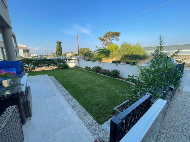 2+1 APARTMENT FOR SALE IN CYPRUS GİRNE ALSANCAK WITH ITS OWN PRIVATE GARDEN 100 METERS FROM THE SEA WITH MOUNTAIN AND SEA VIEWS