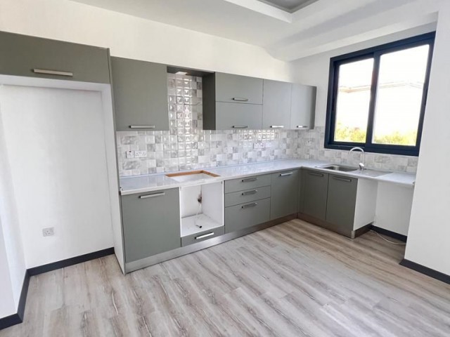 2+1 WOHNUNG ZU VERKAUFEN MIT GARTEN UND TERRASSENMÖGLICHKEITEN IN OZANKOY, ZYPERN GİRNE 