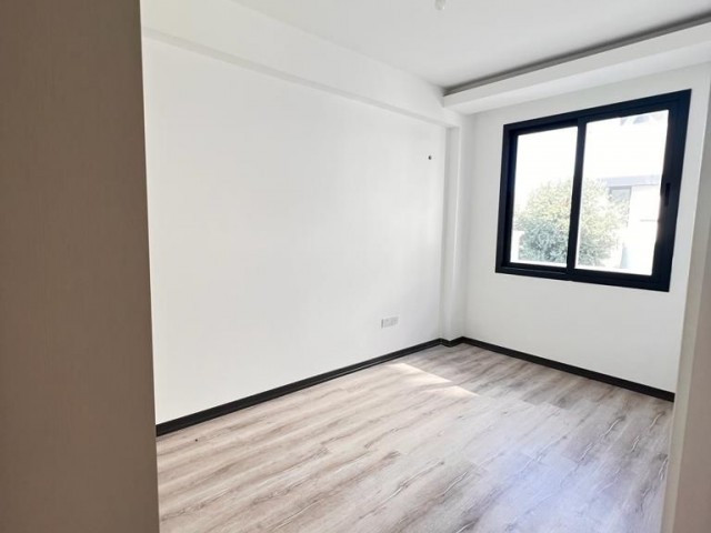 2+1 WOHNUNG ZU VERKAUFEN MIT GARTEN UND TERRASSENMÖGLICHKEITEN IN OZANKOY, ZYPERN GİRNE 