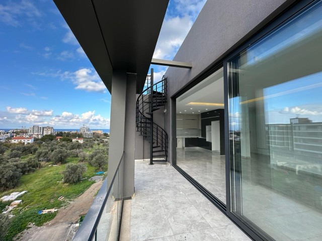 3+1 PENTHOUSE FLAT FOR SALE ON CYPRUS KYRENIA BELLAPAIS ROAD WITH PRIVATE TERRACE AND JACUZZI INFRASTRUCTURE ON THE TERRACE, WITH STUNNING MOUNTAIN AND SEA VIEWS