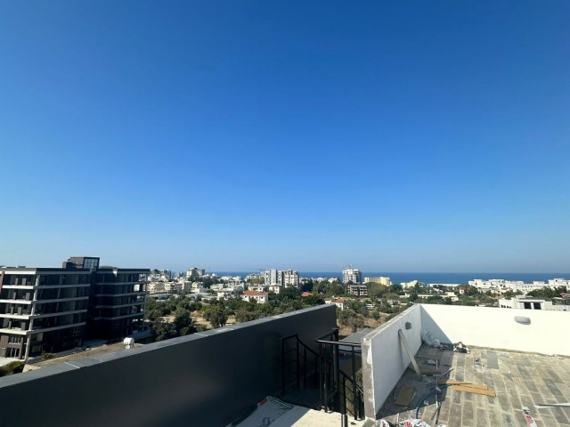 3+1 PENTHOUSE FLAT FOR SALE ON CYPRUS KYRENIA BELLAPAIS ROAD WITH PRIVATE TERRACE AND JACUZZI INFRASTRUCTURE ON THE TERRACE AND WITH STUNNING MOUNTAIN AND SEA VIEWS